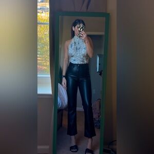 The limited white and black floral halter blouse